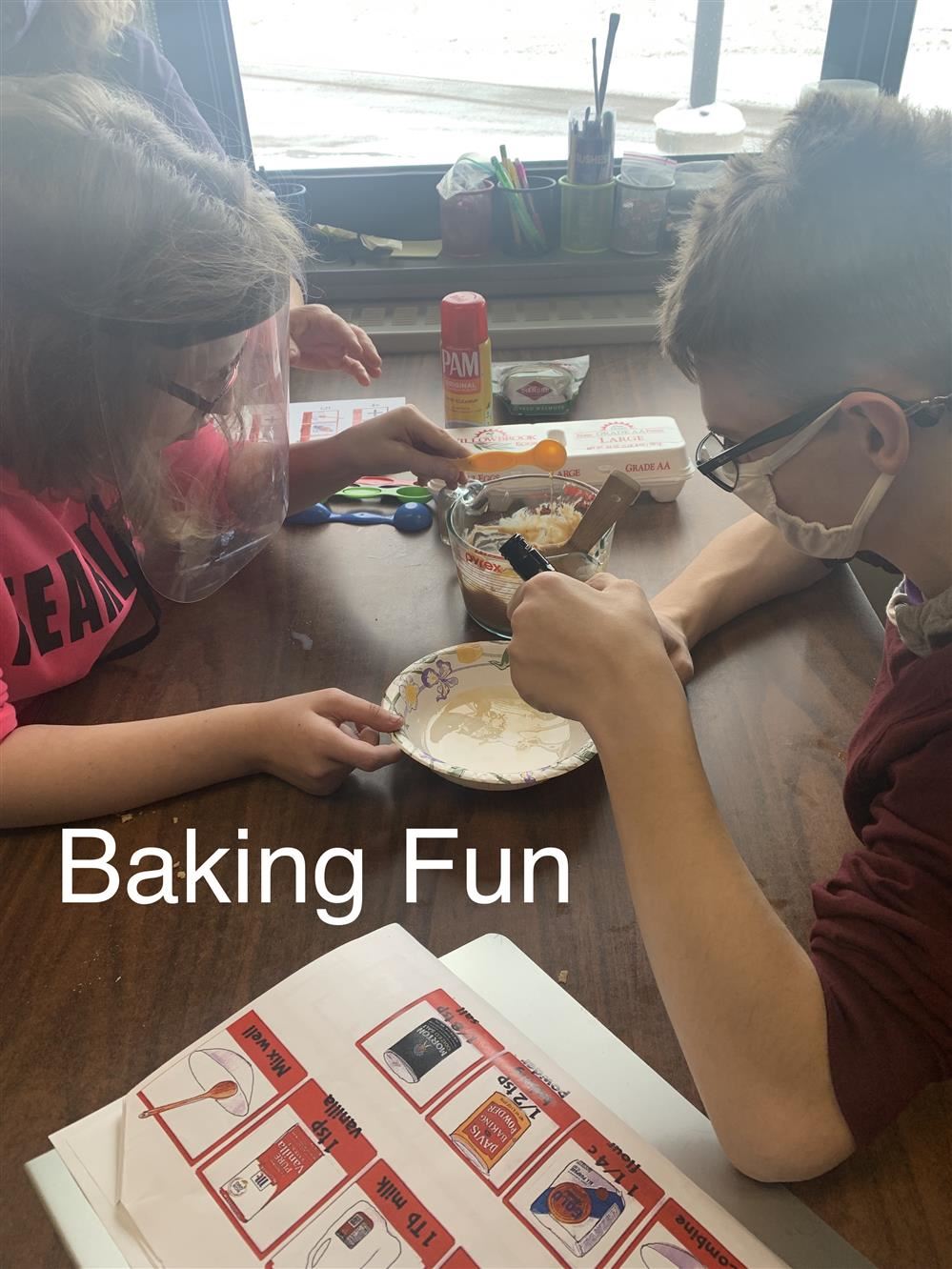  Students working together to mix ingredients for Chocolate Chip Bars